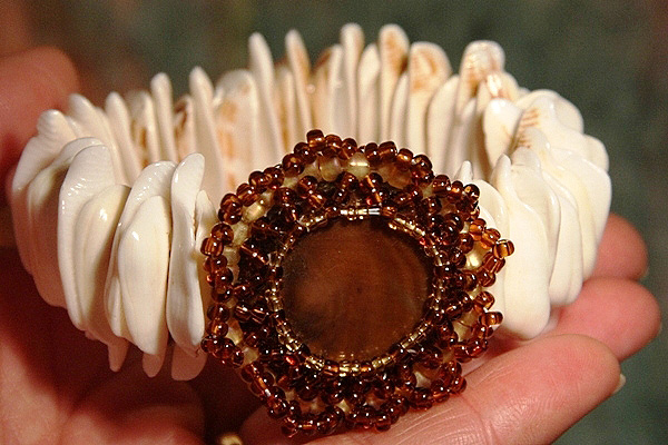 Natural Seashell Bracelet with Intricately Beaded Focal Stone