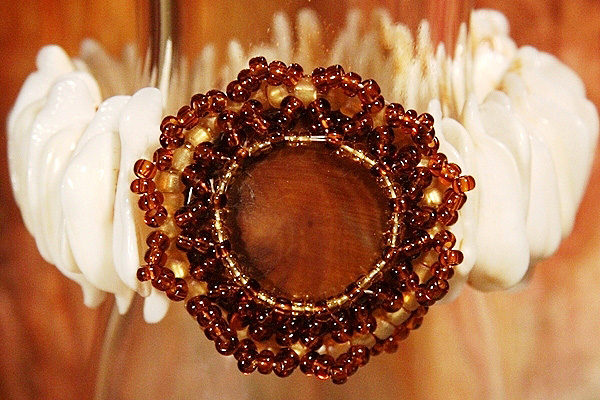 Natural Seashell Bracelet with Intricately Beaded Focal Stone