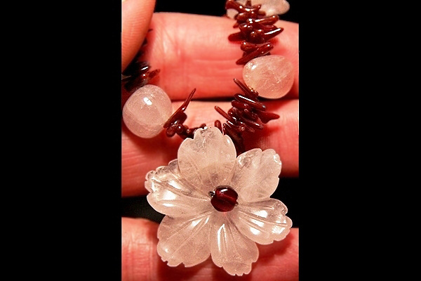 Rose Quartz Flower among Burgundy Coral Thorns