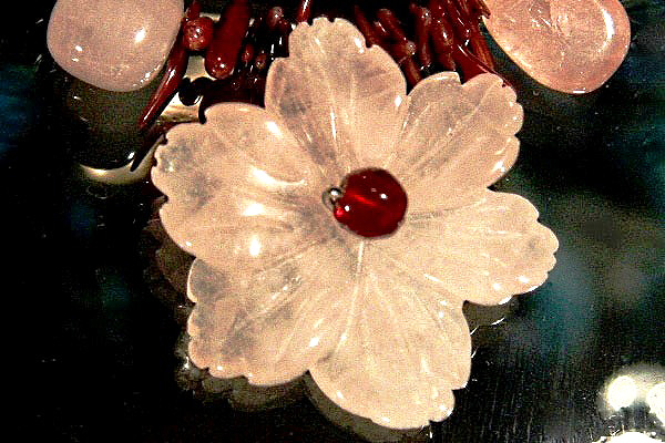 Rose Quartz Flower among Burgundy Coral Thorns